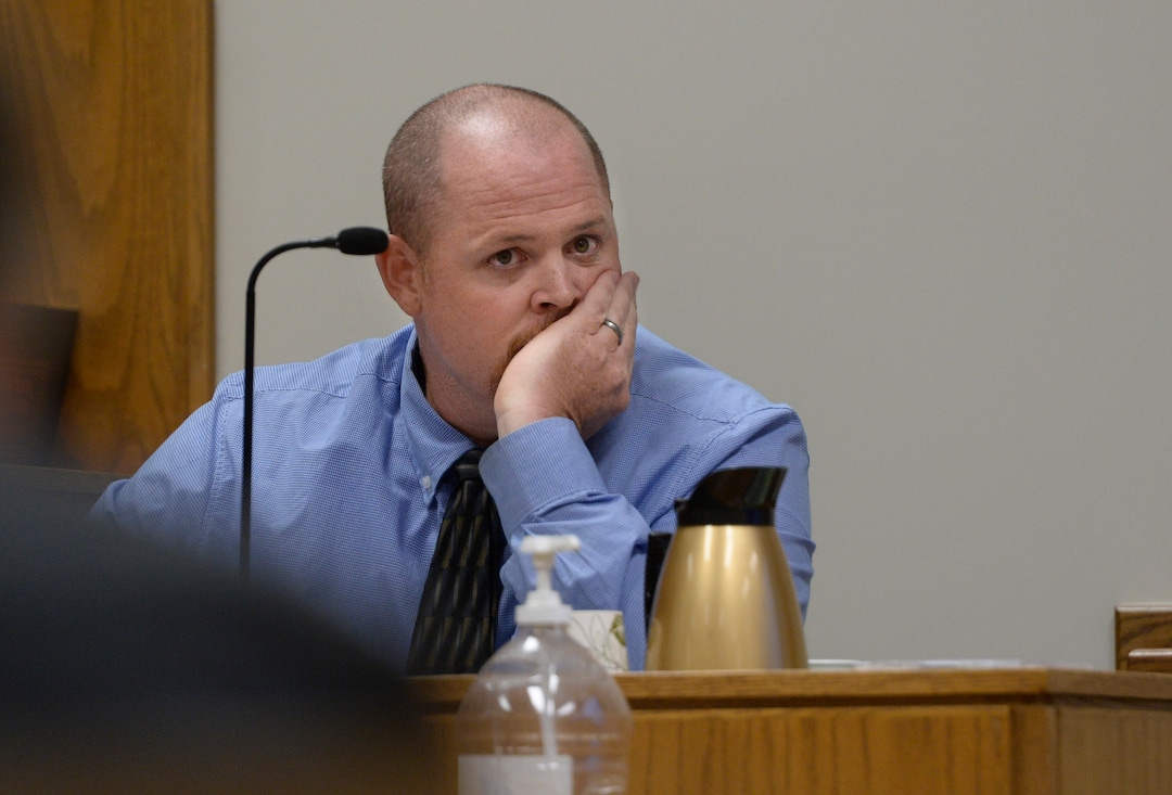 (Scott Sommerdorf   |  The Salt Lake Tribune)   Detective David Sorenson of the Utah County Sheriff's office glances over at the defendant during a break in testimony in the preliminary hearing for Defendant Tyerell Joe Przybycien, 18, of Spanish Fork, Wednesday, August 23, 2017. The testimony was about video interviews conducted at the Sheriff's offices after Przybycien was brought in for questioning.  Przybycien is charged with first-degree felony murder for buying items used by a 16-year-old girl to hang herself on May 5 in Utah County. Przybycien also recorded the girl's death, according to charges.