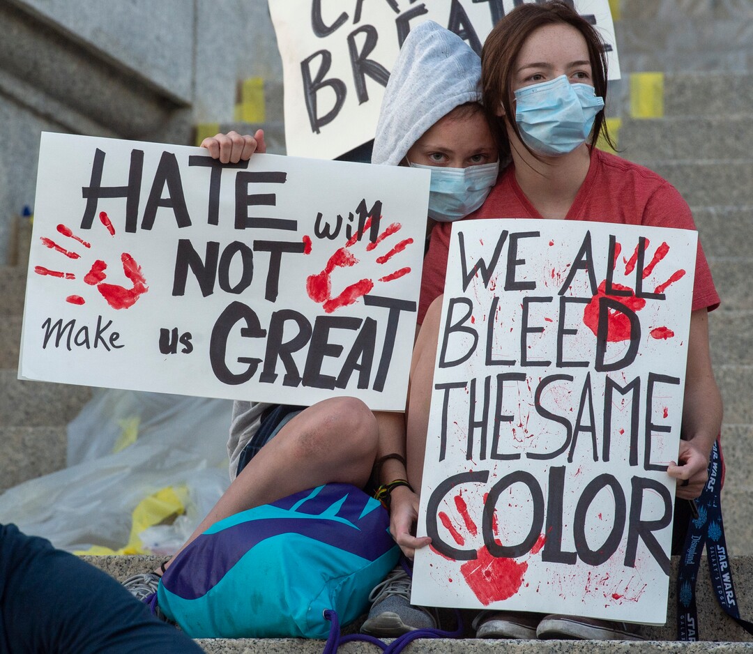 (Rick Egan  |  The Salt Lake Tribune)     Chloe Overman and Ellie Mann listen to speeches on the steps of the State Capitol, during a demonstration in Salt Lake City, on Wednesday, June 10, 2020.