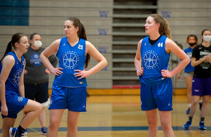 (Francisco Kjolseth  | The Salt Lake Tribune) Fremont girls basketball players Emma Calvert, left, and Maggie Mendelson listen to instruction during a recent practice. The team is a top 15 program in the country, per MaxPreps, and is led by 3 highly recruited girls including Calvert and Mendelson.
