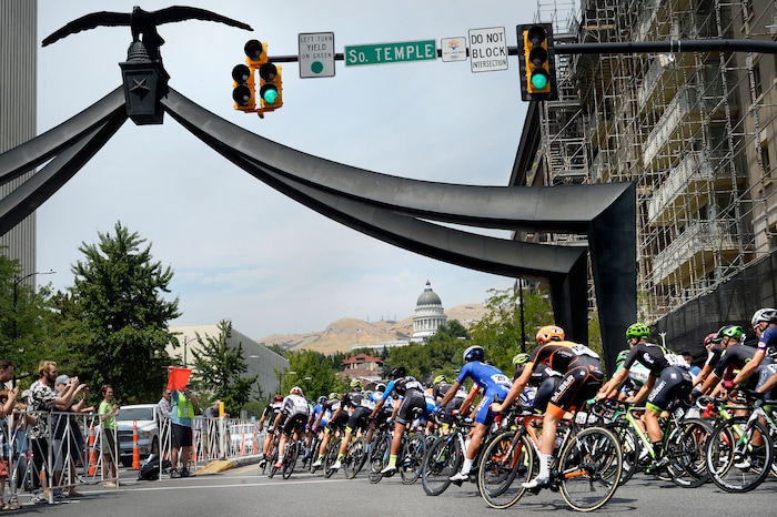 (Scott Sommerdorf   |  The Salt Lake Tribune)   Riders make the turn onto State Street and head toward the uphill climb to the Capitol. Robert Britton is the winner of the 2017 Tour of Utah, Sunday, August 6, 2017.