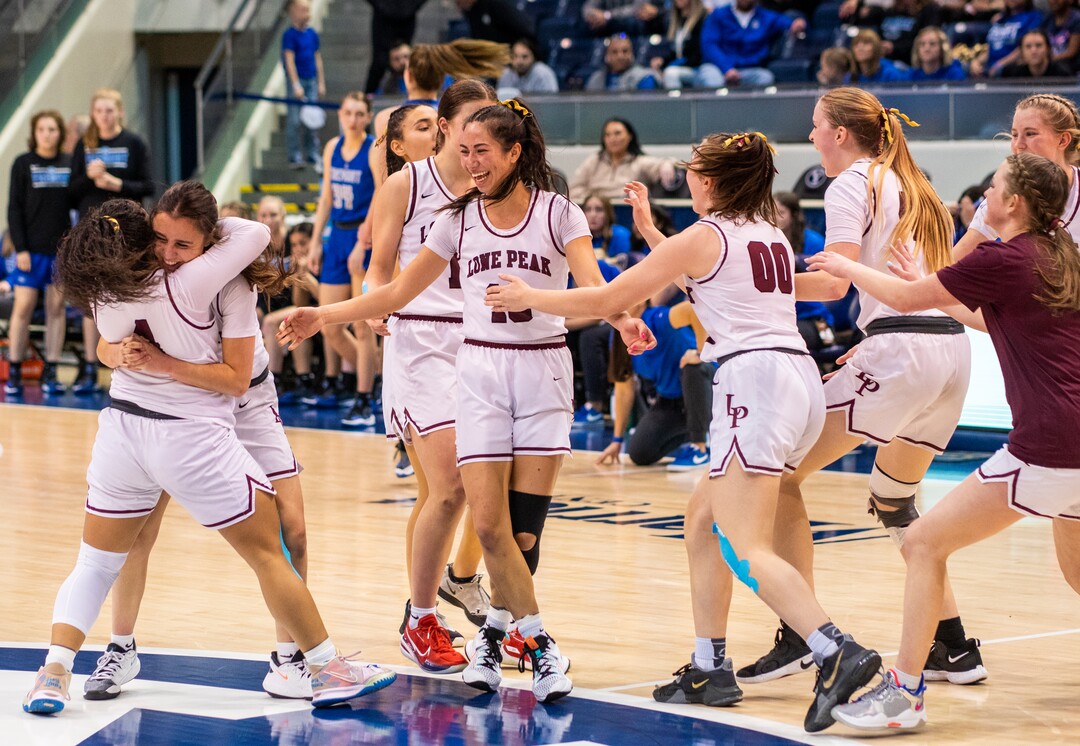 (Rick Egan | The Salt Lake Tribune) Lone Peak celebrates their 67-65 double-overtime win over Fremont, in the 6A State Championship game, at the Marriott Center in Provo, on Saturday, March 5, 2022.  Ika, hit the winning shot with .5 seconds left on the clock. 