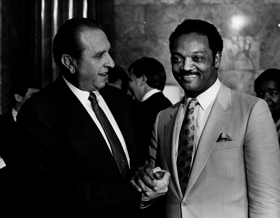 (Tribune file photo) President Thomas S. Monson and the Rev. Jesse Jackson in 1988.