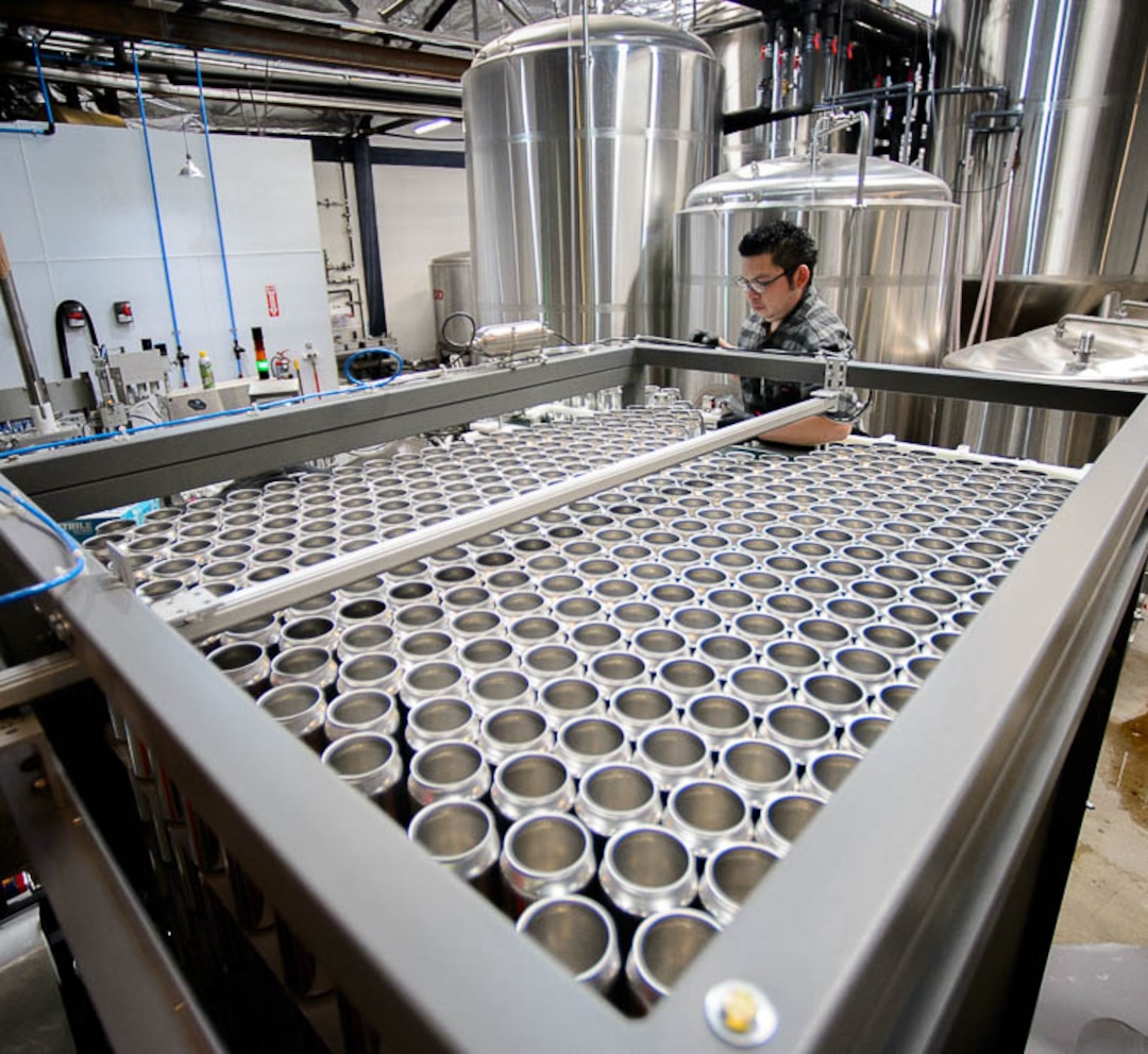 (Trent Nelson | The Salt Lake Tribune)  Eddie Landa at Kiitos Brewing, a one-year-old Utah brewery that makes  "green" or environmentally responsible beer. Kiitos is the only brewery in the state with a High-Efficiency Brewing System or HEBS, that uses 40 percent less water and 15-20 percent less grain. Thursday July 26, 2018 in Salt Lake City.