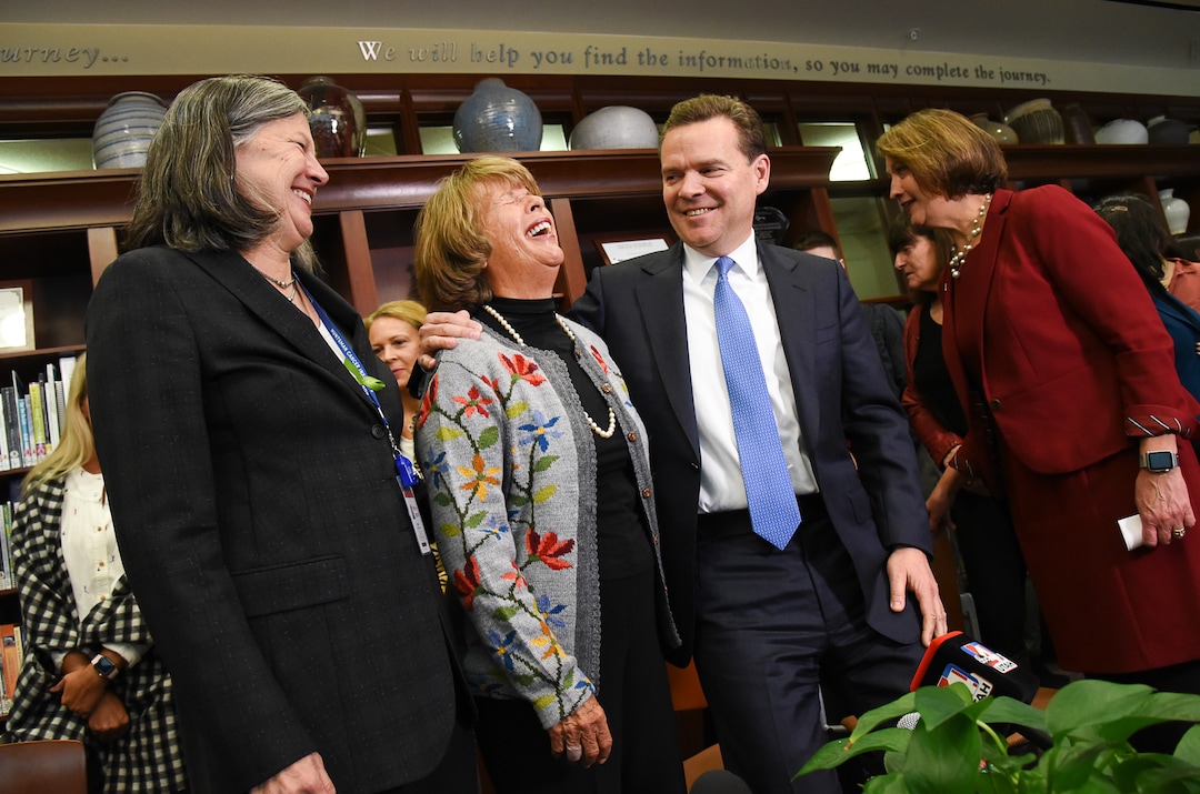 (Francisco Kjolseth  |  The Salt Lake Tribune)  Surrounded by clinicians, researchers and staff, Mary Beckerle, CEO of the Huntsman Cancer Institute, Karen Huntsman, chairwoman of the Huntsman Foundation, Peter Huntsman, chairman and CEO of the Huntsman Cancer Foundation, and Ruth Watkins, president of the University of Utah, from left to right, smile as the Huntsman family announces a $30 million donation to the institute on Friday, Jan. 11, 2019.