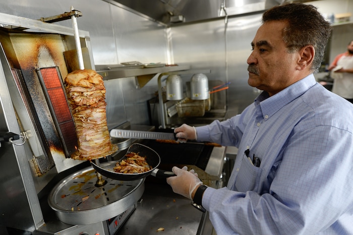(Francisco Kjolseth  |  The Salt Lake Tribune)  Habib Soweidan prepares an order at Beirut Cafe, in Murray.