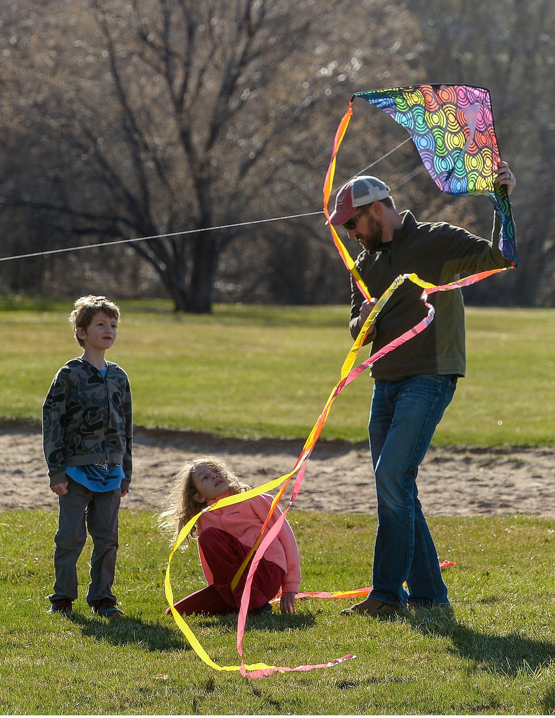 (Leah Hogsten  |  The Salt Lake Tribune) Families and friends congregate at Big Dee Park in Ogden on Sunday after hiking and biking the nearby Ogden River Trail, March 22, 2020. As the global battle against COVID-19 deepens, some Utahns have used the state's great outdoors as an alternative to isolating at home.