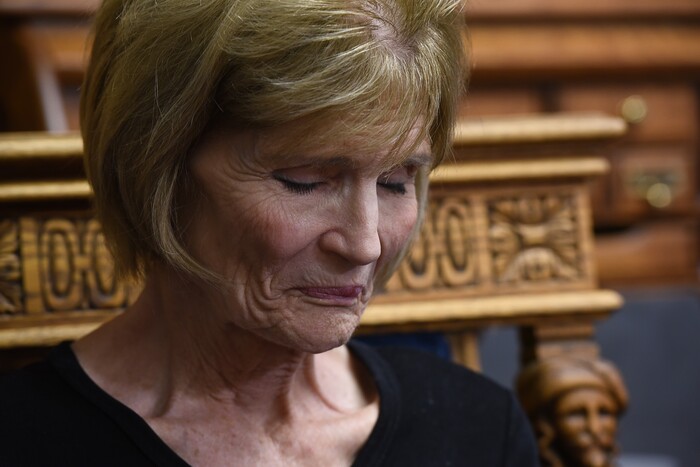 (Francisco Kjolseth  |  The Salt Lake Tribune)  Connie Elison, mother of Thomas Stanfield who was shot and killed by a Citadel security guard last week, closes her eyes as she speaks with the press at the office of attorney, Robert Sykes, in Salt Lake City on Tuesday, June 26, 2018, after filing a civil rights and wrongful death law suit.