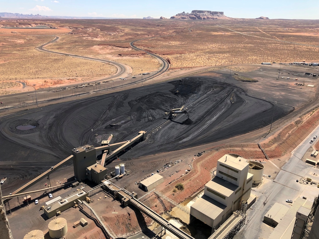 (Susan Montoya Bryan | AP file photo) This Aug. 20, 2019, image shows the coal stockpile at the Navajo Generating Station near Page, Ariz., which ceased operations Monday, Nov. 18, 2019.