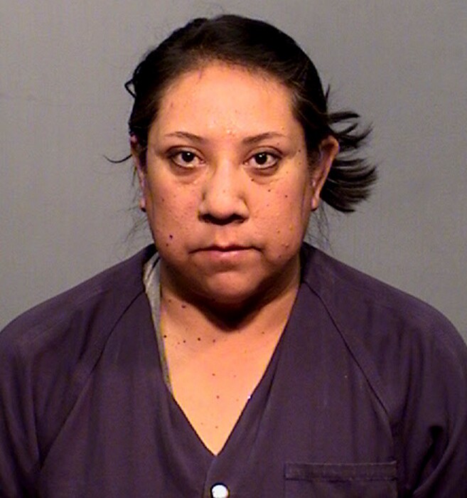 (Coconino County Detention Facility | The Associated Press) This undated booking photo provided by Coconino County Detention Facility shows Karis Begaye. Begaye, the chief legal counsel to the Navajo Nation president, has been placed on administrative leave, weeks after she was arrested on suspicion of driving while intoxicated. Navajo President Russell Begaye made the announcement Tuesday, May 8, 2018, that the legal counsel, Karis Begaye, is his daughter.