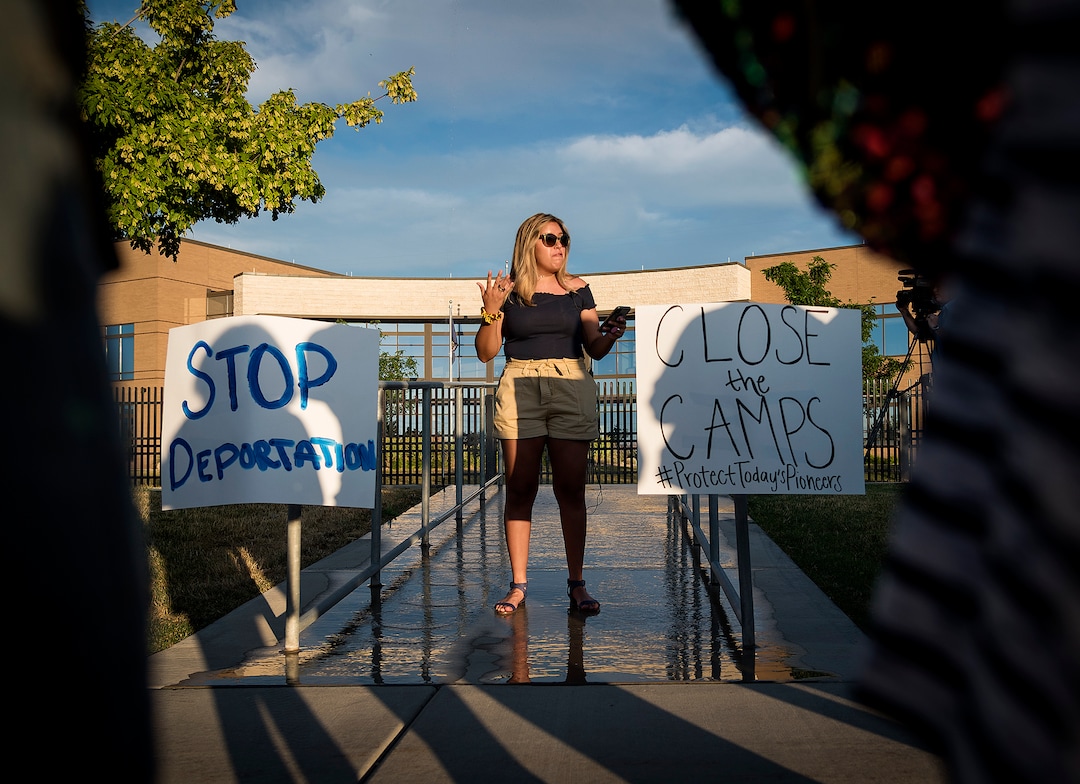 Michael Mangum  |  Special to the Tribune

Paola Severo of South Jordan recites a poem during a protest outside the U.S. Immigration and Customs Enforcement Salt Lake City Field Office in West Valley City, UT on Wednesday, July 24, 2019.