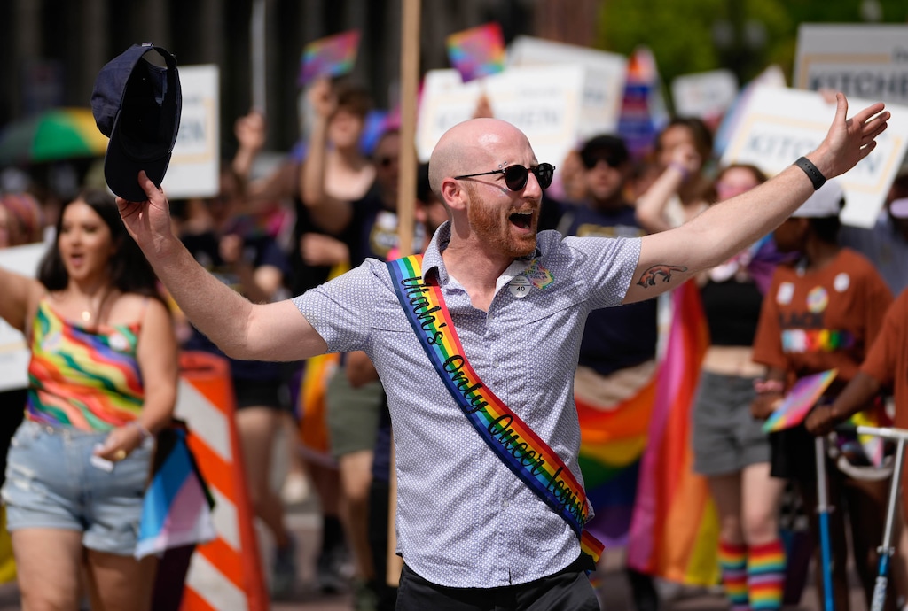 (Francisco Kjolseth | The Salt Lake Tribune) Senator Derek Kitchen waves to the crowds as he participate in the Utah Pride Parade in Salt Lake City on Sunday, June 5, 2022, the first in three years.
