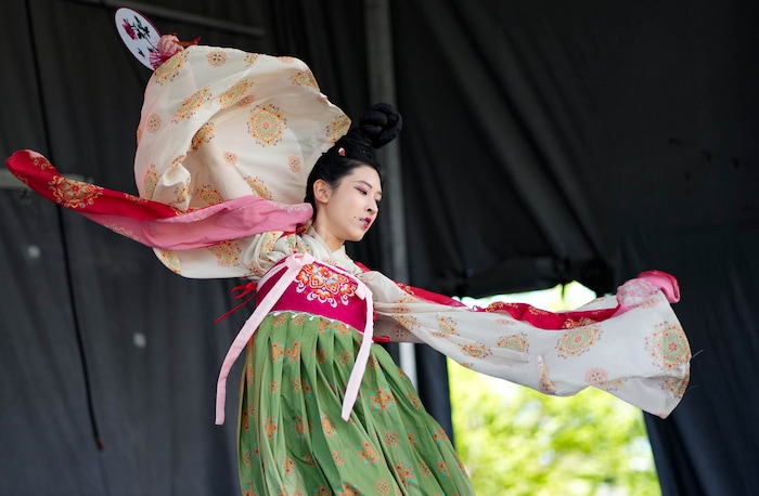 (Francisco Kjolseth | The Salt Lake Tribune) The Salt Lake Chinese Dance Arts & Eastern Arts group performs at the Living Traditions festival in Salt Lake City on Saturday, May 21, 2022.