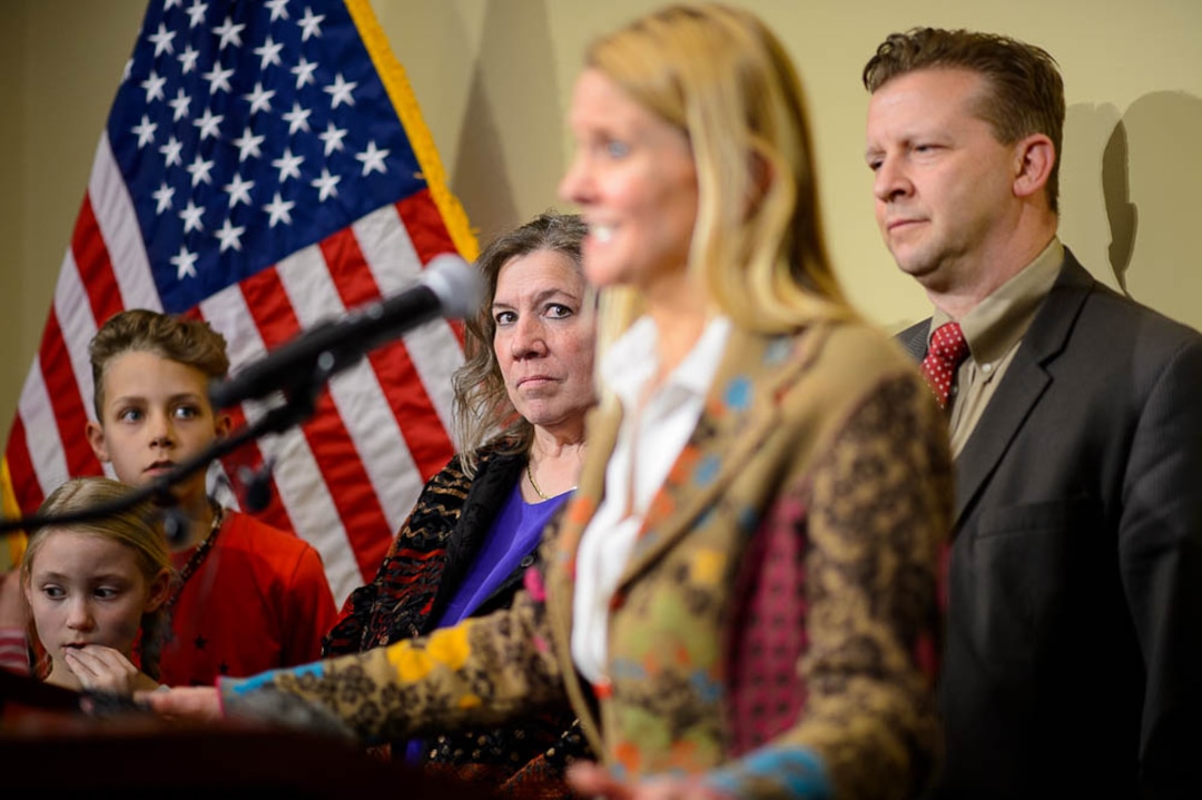 (Trent Nelson | The Salt Lake Tribune)  Valley View Elementary School teacher Moana Patterson listens as Tiffany Ivens-Spence speaks at a news conference by parents and students to show support for Patterson, in Salt Lake City on Monday March 11, 2019. Sen. Todd Weiler, R-Woods Cross, at right. Ivens-Spence is the parent of a student at the school.