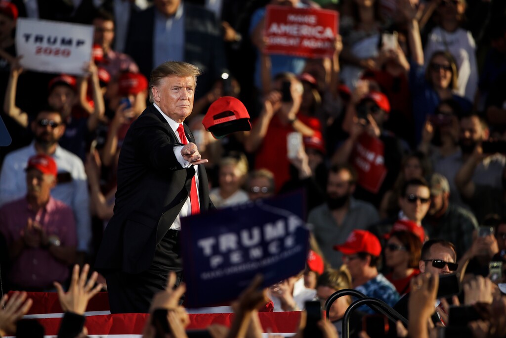 (Matt Rourke | AP file photo) President Donald Trump tosses a hat during a campaign rally in Montoursville, Pa., Monday, May 20, 2019.