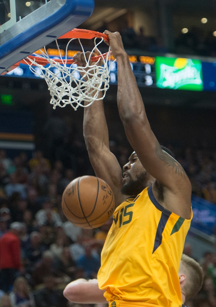 (Rick Egan  |  The Salt Lake Tribune)  Utah forward Derrick Favors (15) scores for the Jazz, in NBA action Utah Jazz vs Indiana Pacers, in Salt Lake City, Monday, January 15, 2018.


