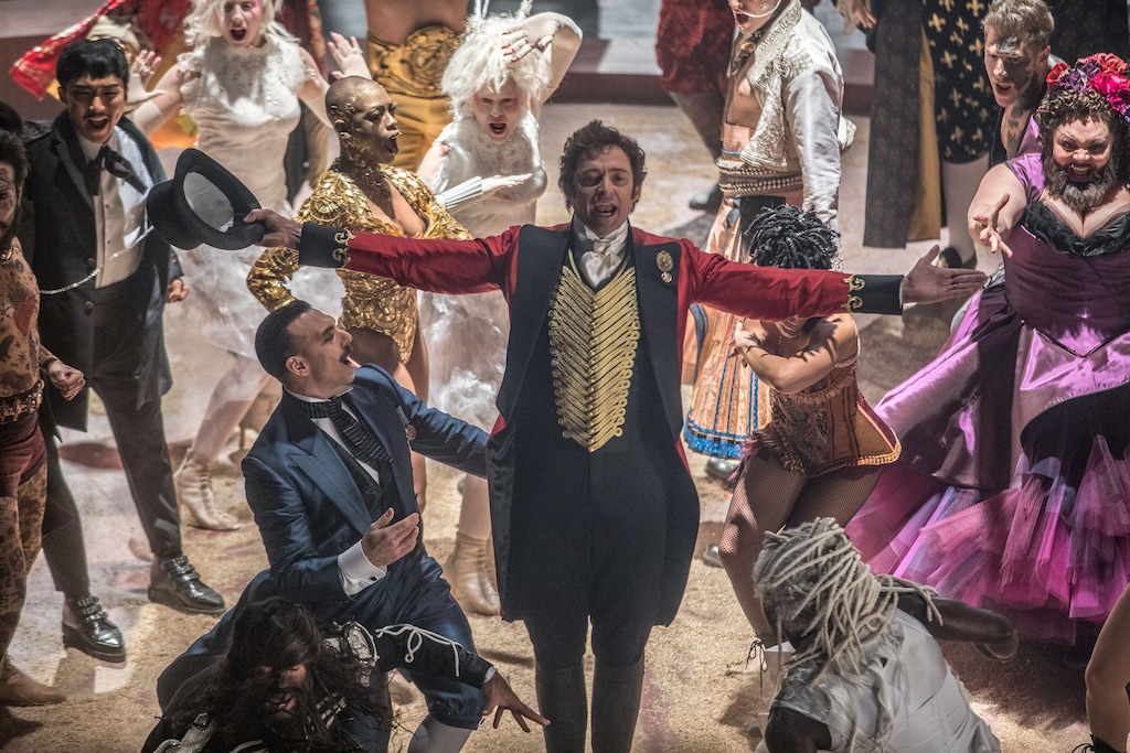 (Niko Tavernise  |  20th Century Fox) P.T. Barnum (Hugh Jackman) serves as master of ceremonies for his extravaganza, in the musical biopic "The Greatest Showman."