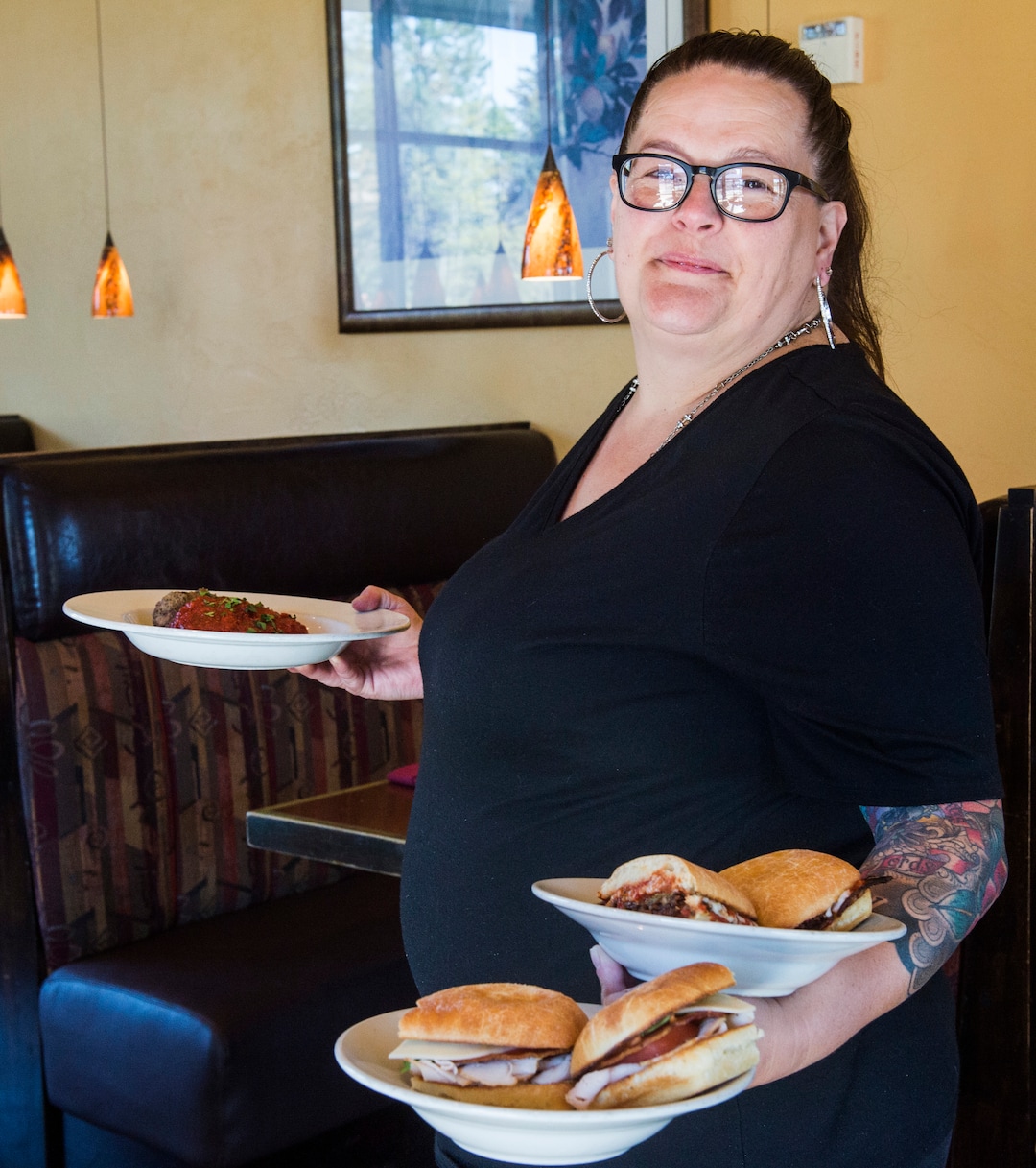 (Rick Egan  |  The Salt Lake Tribune)     Waitress Dounia Livingston at Fratelli's Italian Ristorante, in Sandy, Thursday, Sept. 20, 2018.