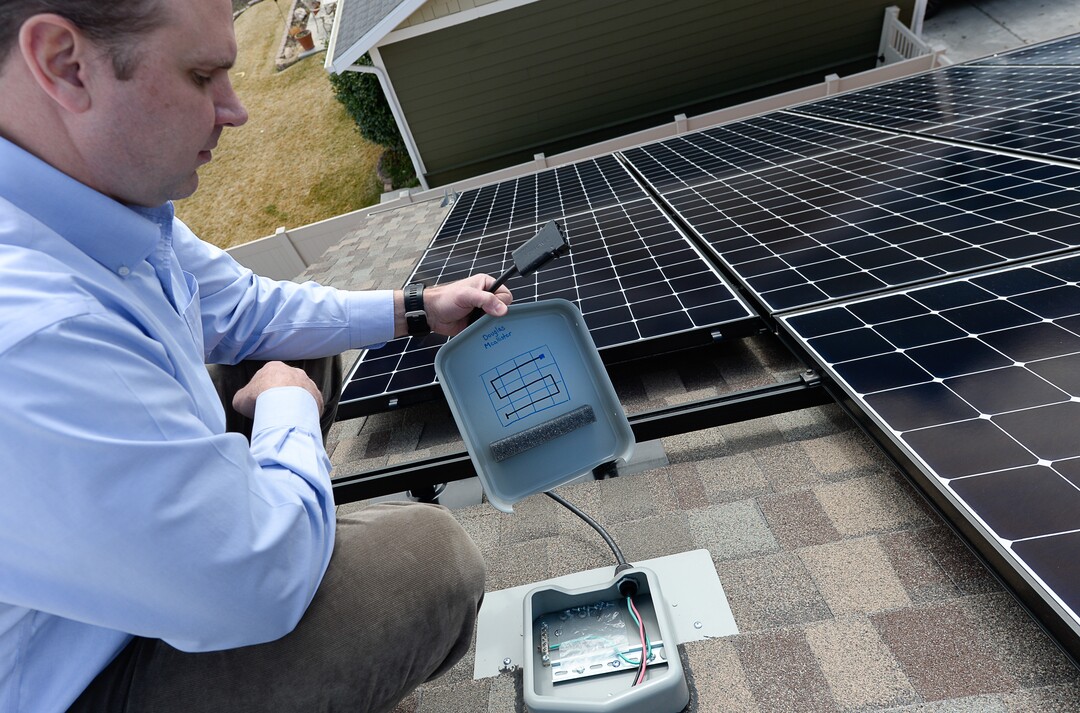 (Francisco Kjolseth  |  The Salt Lake Tribune)  Doug McAllister of South Jordan bought a solar panel array from Legend Solar last September. In December, Legend Solar started putting the panels but never finished. McAllister owes more than $12,000 on a loan he took out to finance the panels. The company has indicated to him that they are unable to hire an electrician to finish the job and the array sits idle on his roof, two panels short and unconnected. 