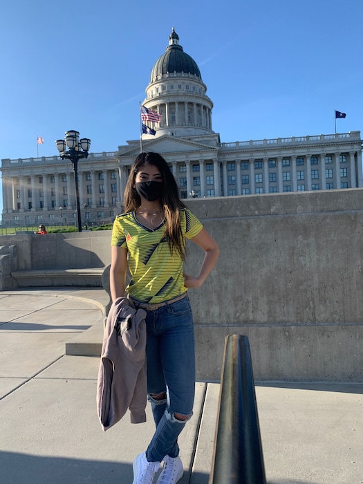 Maria Pastrana Lopez stands in front of Utah State Capitol.