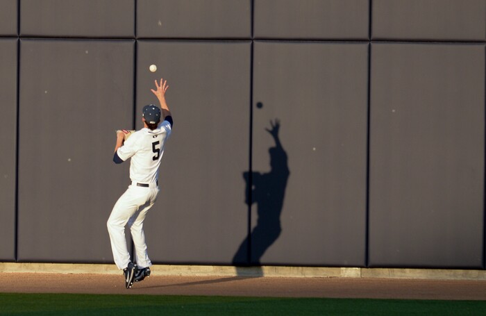 (Leah Hogsten  |  The Salt Lake Tribune) BYU's Isaac Cruz grabs a hit from Utah's Erick Migueles in the 5th inning as Brigham Young University hosts University of Utah at Miller Park, Tuesday, April 24, 2018 in Provo.