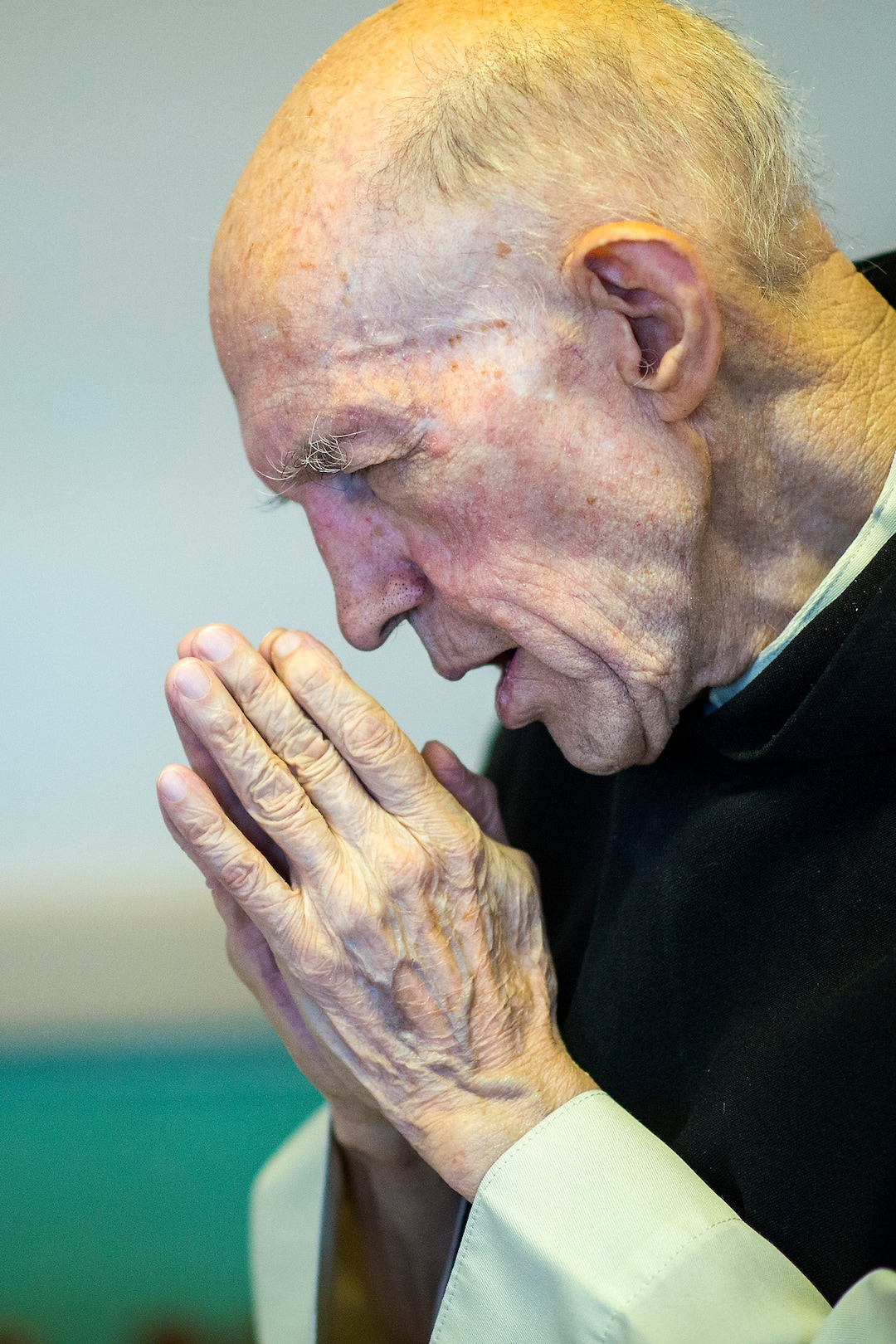 (Chris Detrick  |  The Salt Lake Tribune)  "Father Patrick" Boyle blesses the Vore family, of Farr West, in the bookstore and gift shop at the Abbey of Our Lady of the Holy Trinity in Huntsville on Wednesday, Aug. 23, 2017.