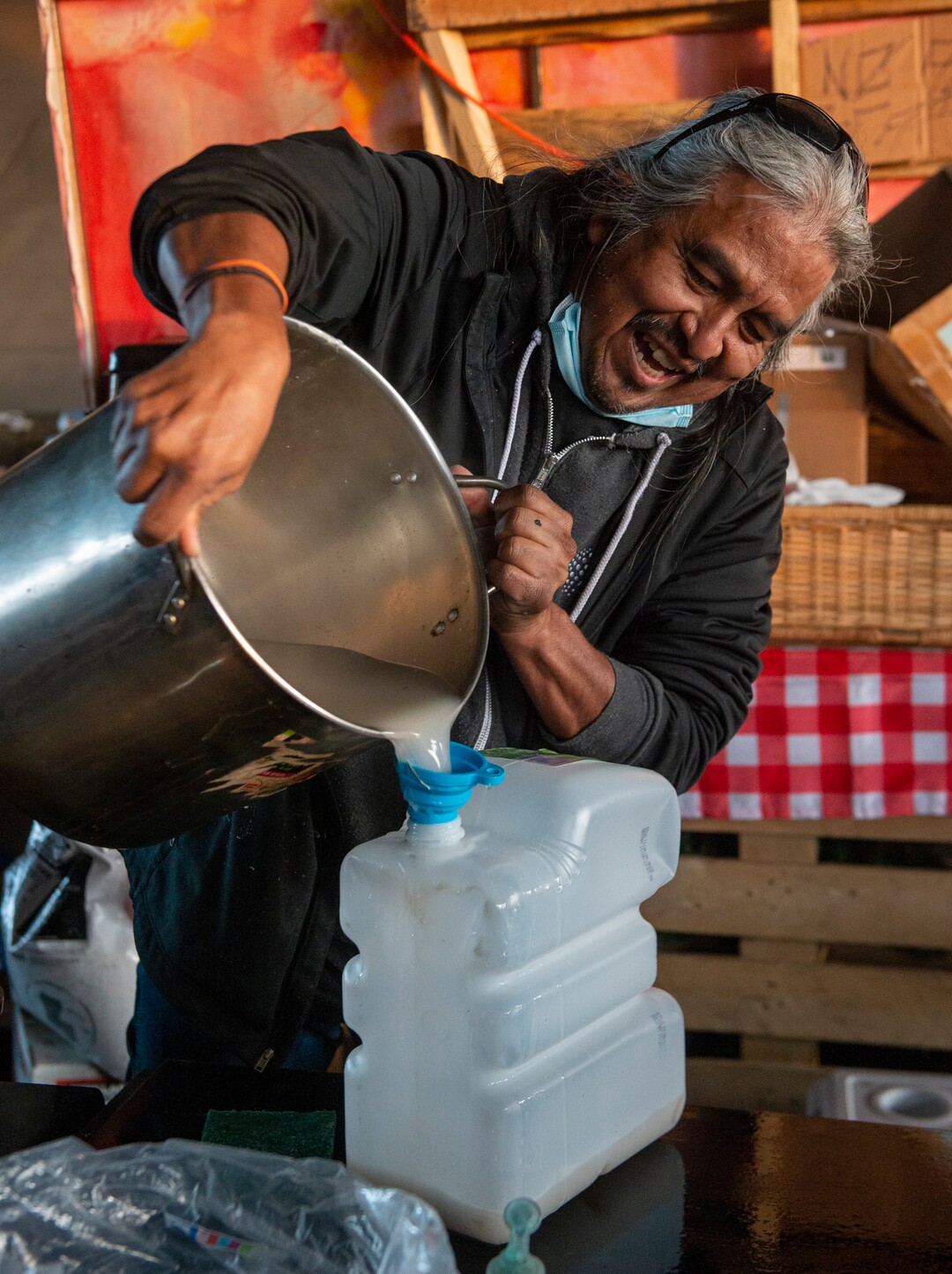 (Rick Egan | The Salt Lake Tribune) Dave John, a volunteer with the nonprofit group PANDOS, cooks meals at Camp Last Hope on Saturdays and Sundays. Saturday, Jan. 2, 2021.