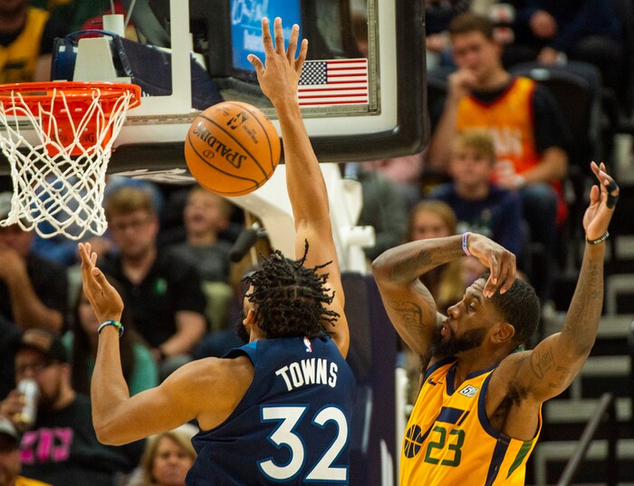(Rick Egan  |  The Salt Lake Tribune)     Utah Jazz forward Royce O'Neale (23) blocks a shot by Minnesota Timberwolves center Karl-Anthony Towns (32), in NBA action between the Utah Jazz and the Minnesota Timberwolves in Salt Lake City, Monday, Nov. 18, 2019.