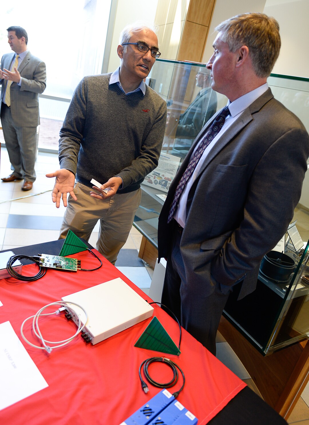 (Francisco Kjolseth  |  The Salt Lake Tribune)  Rice University Professor Ashu Sabharwal, left, speaks with James Kimberly of National Instruments, following a press event at the University of Utah on Monday, April 9, 2018, to announce POWDER: Platform for Open Wireless Data-driven Experimental Research, as Salt Lake City becomes a "testbed" for the next generation of wireless technology. 