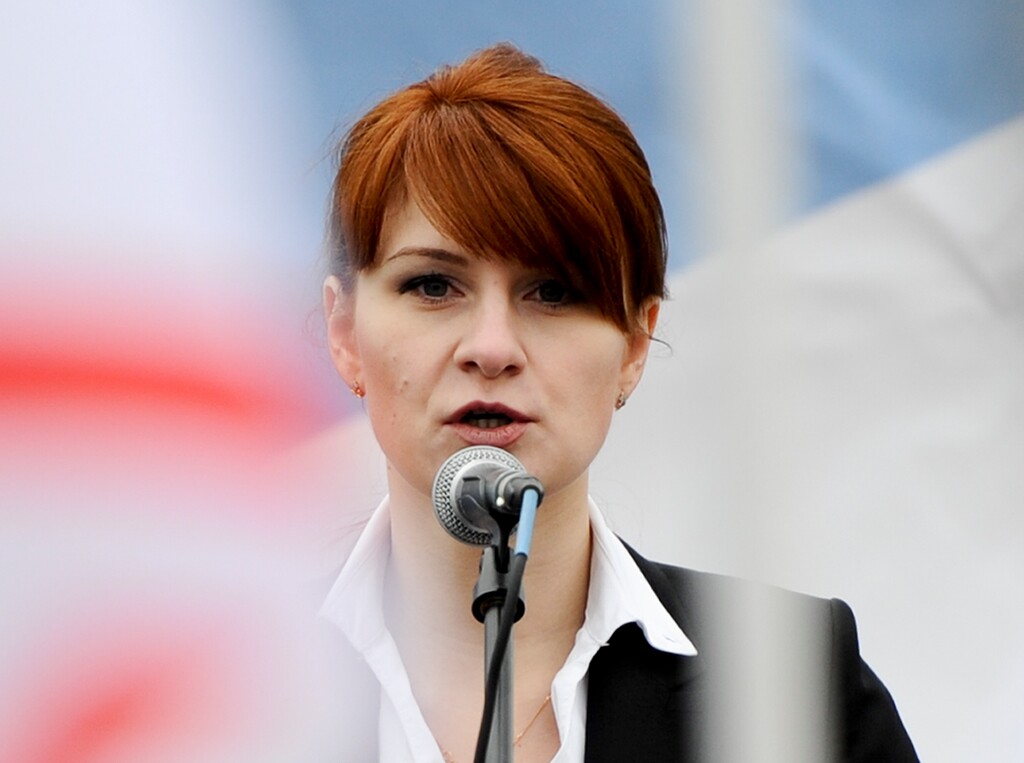 FILE - In this April 21, 2013, file photo, Maria Butina, leader of a pro-gun organization in Russia, speaks to a crowd during a rally in support of legalizing the possession of handguns in Moscow, Russia. Butina, accused of being a secret agent for the Russian government appears to be coming closer to a plea deal with U.S. prosecutors or other resolution of her criminal case. (AP Photo)