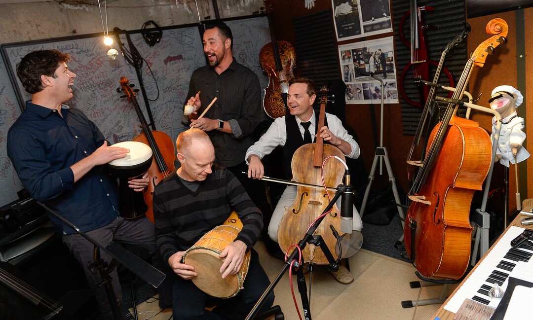 (Francisco Kjolseth  |  The Salt Lake Tribune)  Always having fun, The Piano Guys gather in their home studio in Sandy recently as they get ready for an upcoming show. Clockwise from left, videographer Paul Anderson, music producer Al van der Beek, cellist Steven Sharp Nelson and pianist Jon Schmidt maintain a close bond and are always quick with a tease or a joke while making music.
