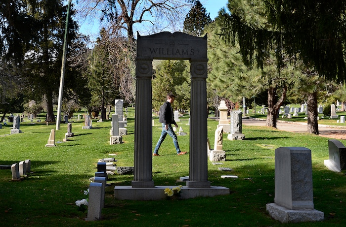 (Scott Sommerdorf | The Salt Lake Tribune)
City Councilman Chris Wharton, who represents the area around the Salt Lake City Cemetery, walks in one of the older areas, Friday, April 13, 2018. Wharton is involved in an effort to help get more funding for the renewal of the cemetery. 

