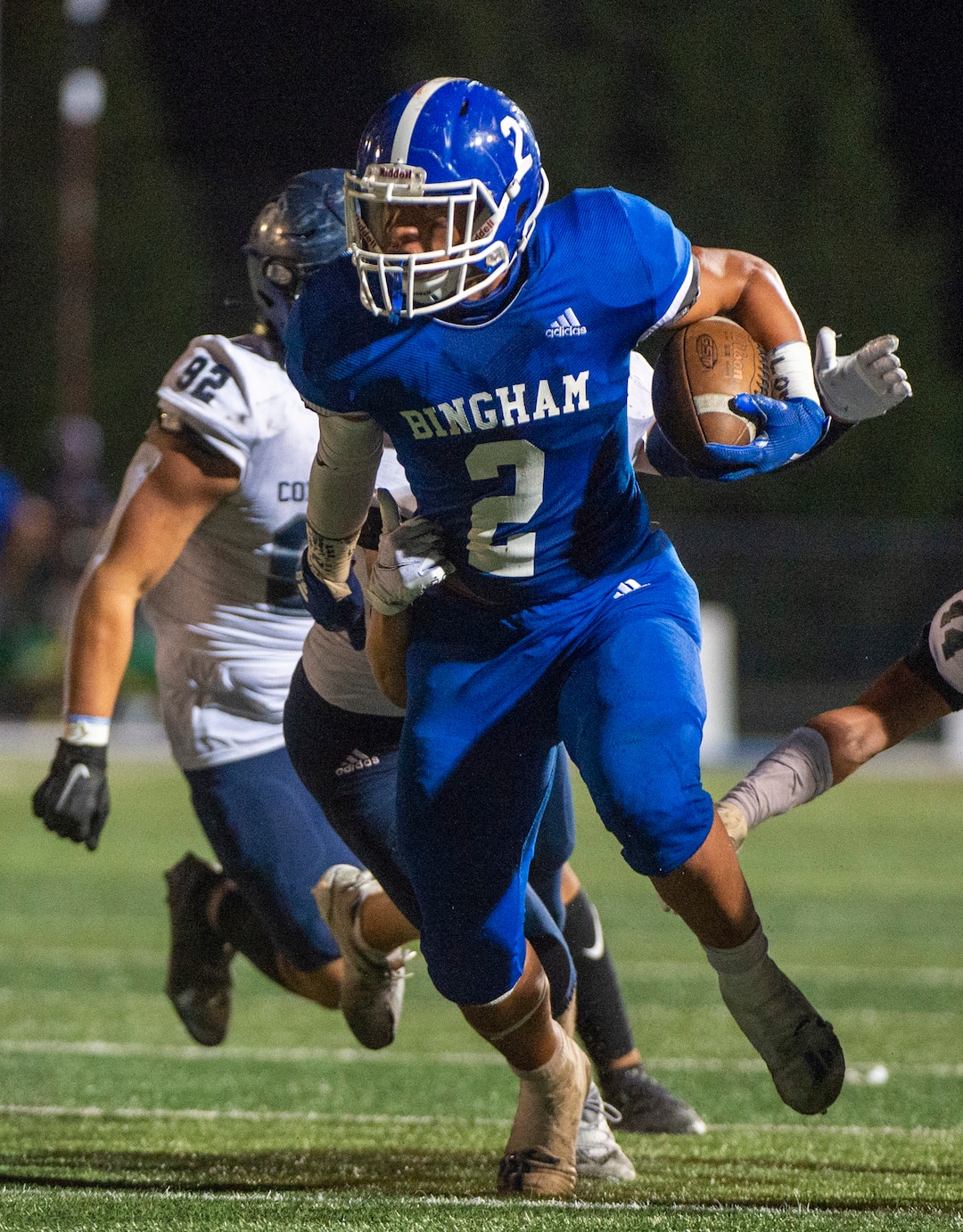(Rick Egan  |  The Salt Lake Tribune)     Saia Lomu runs the ball for Bingham, in prep action between the Bingham Miners and the Corner Canyon Chargers, at Bingham High onFriday, Aug. 28, 2020.