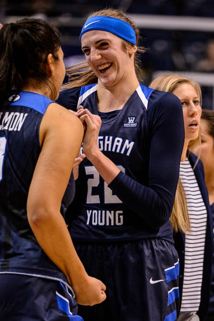 (Trent Nelson | The Salt Lake Tribune)  Brigham Young Cougars forward Shalae Salmon (3) and Brigham Young Cougars center Sara Hamson (22) celebrate the win as BYU hosts Utah, NCAA women's basketball in Provo, Saturday December 9, 2017.