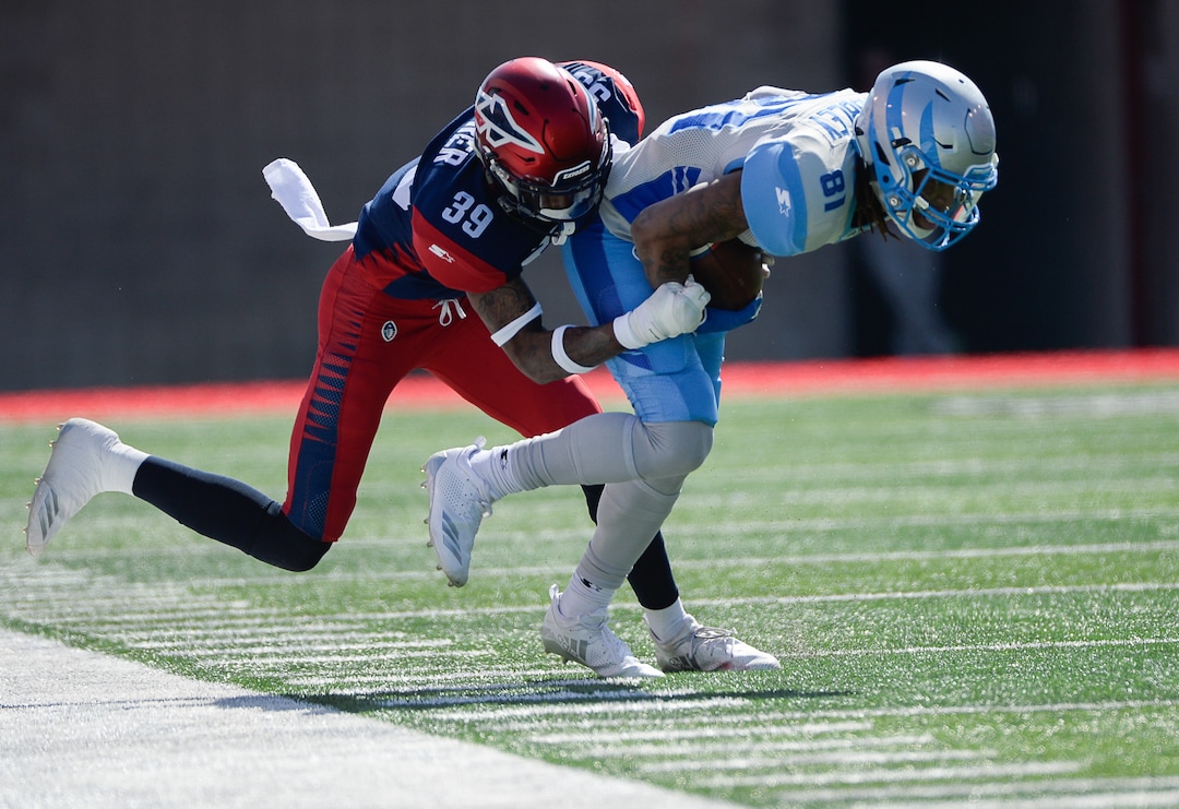 (Francisco Kjolseth  |  The Salt Lake Tribune)  Jeremy Cutrer #39 of the Memphis Express takes down Sam Mobley #81 of the Salt Lake Stallions after a successful catch as the Salt Lake Stallions host the Memphis Express of the Alliance of American Football in Salt Lake City on Saturday March 16, 2019.
