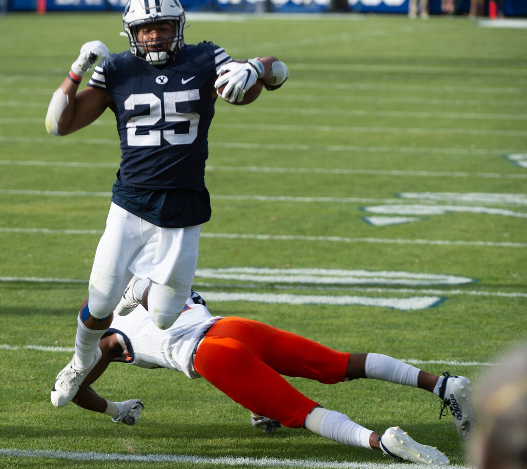 (Rick Egan  |  The Salt Lake Tribune)    Brigham Young running back Tyler Allgeier (25) runs for a Cougar touchdown, in football action between the Brigham Young Cougars and the UTSA Roadrunners, at Lavell Edwards stadium, Saturday, Oct. 10, 2020.