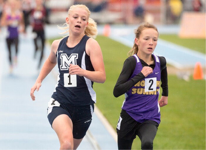 Rick Egan  |  The Salt Lake Tribune

Anna Camp, Millard, leads the pack midway through the race, along along with Sadie Sargent, North Summit, 2A girls 1600 Meter run, as she finishes a in the Utah State Track Championships at BYU, Friday, May 15, 2015.   Camp took first place in the race.
