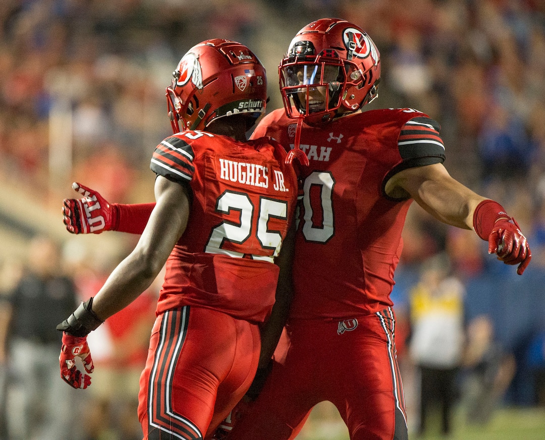 (Rick Egan  |  The Salt Lake Tribune) Utah Utes linebacker Cody Barton (30) and Utah Utes defensive back Casey Hughes (25) sacks Brigham Young Cougars quarterback Tanner Mangum (12), in football action BYU vs Utah, at Lavell Edwards Stadium in Provo, Saturday, September 9, 2017.