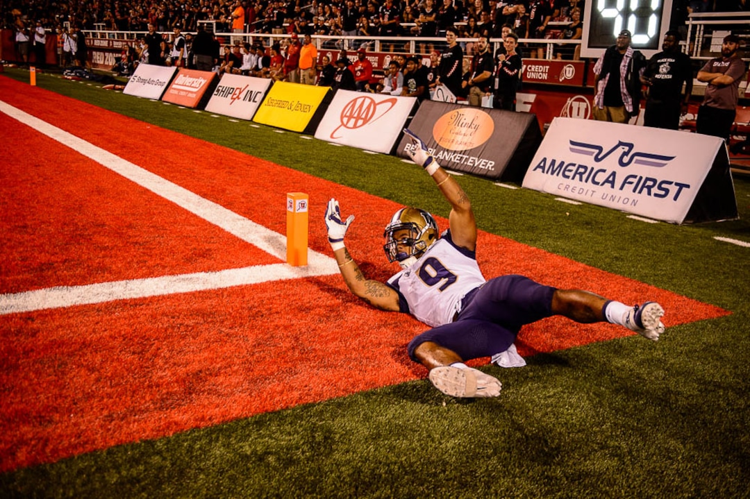 (Trent Nelson | The Salt Lake Tribune)  Washington Huskies running back Myles Gaskin (9) celebrates an early touchdown as the University of Utah hosts Washington at Rice-Eccles Stadium in Salt Lake City, Saturday Sept. 15, 2018.