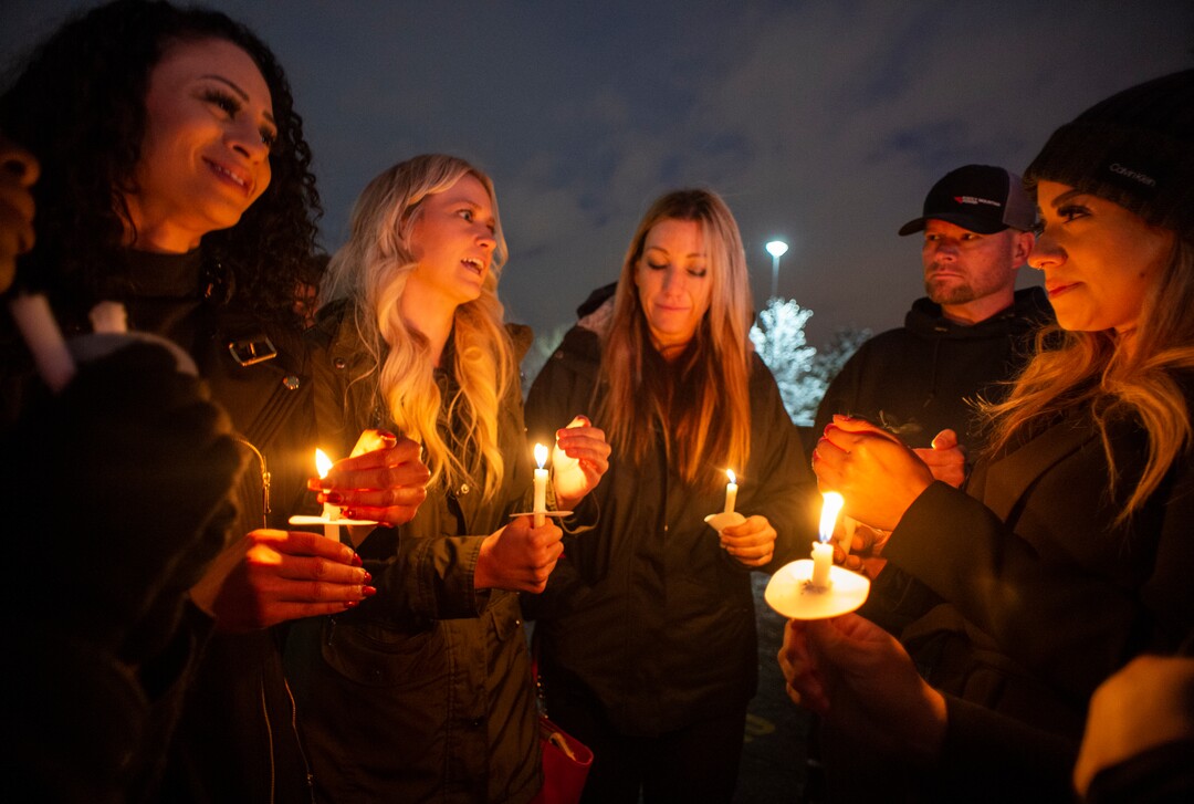 (Rick Egan  |  The Salt Lake Tribune)      People who worked with David Stokoe reminisce about the friend they lost, during a candlelight vigil for David Stokoe, a real estate agent killed at one of his rentals last week. Monday, Jan. 21, 2019.
