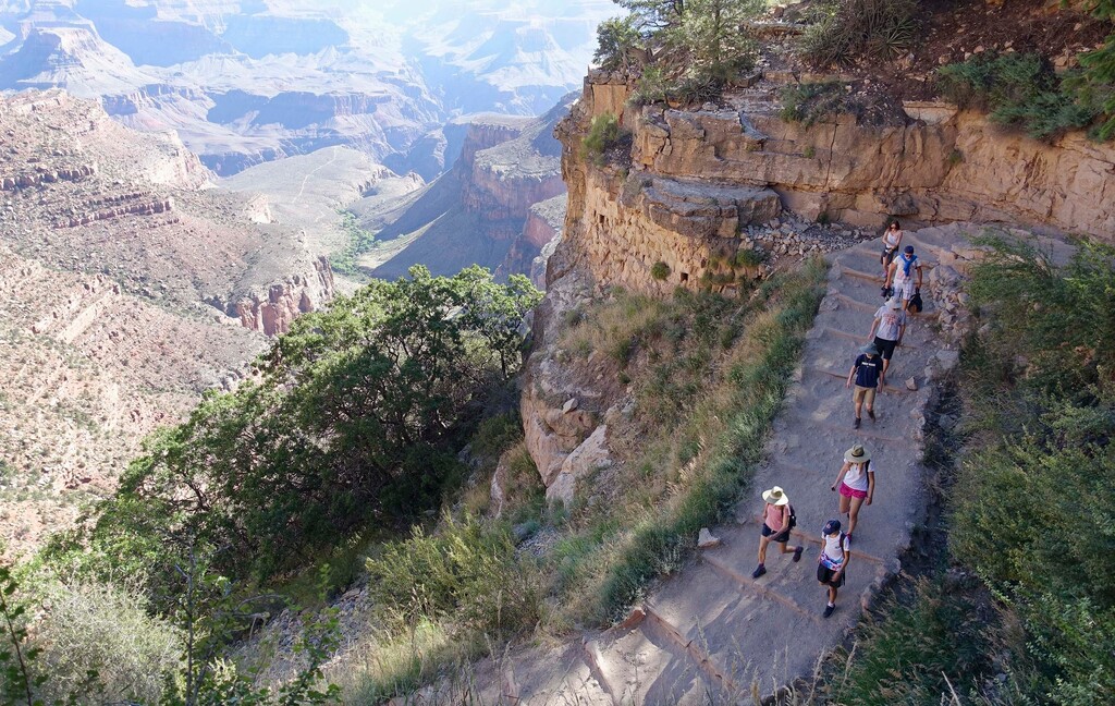 (Ross D. Franklin | AP) In this July 27, 2015 photo, the busy Bright Angel Trail is crowded with hikers headed down into the Grand Canyon at Grand Canyon National Park, Ariz.