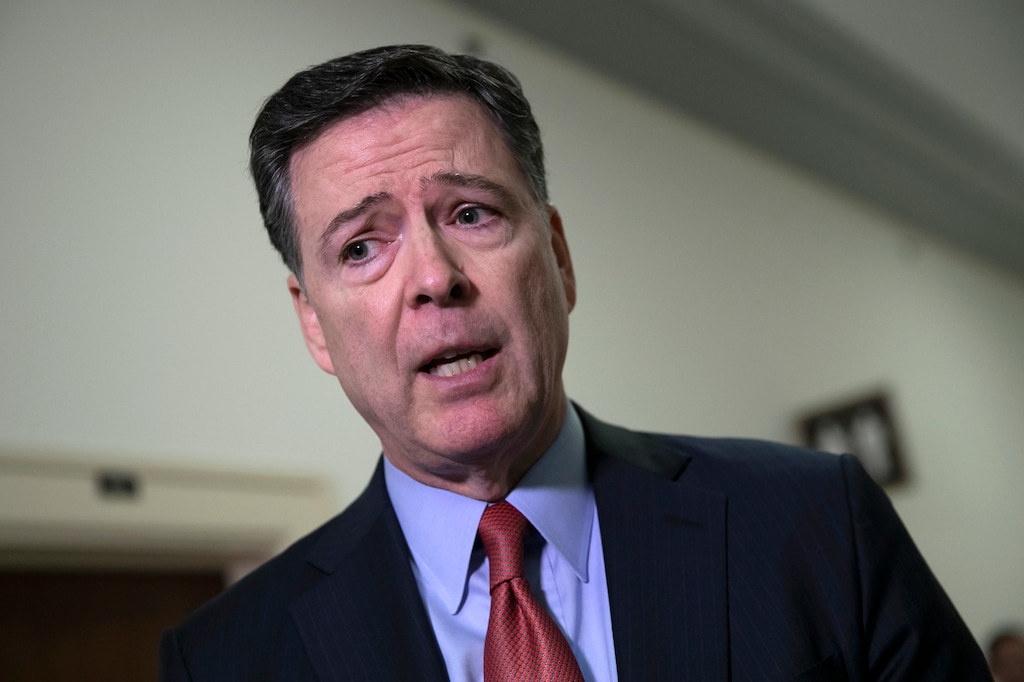 Former FBI Director James Comey speaks to reporters on Capitol Hill Washington, Monday, Dec. 17, 2018, after a second closed-door interview with two Republican-led committees investigating what they say was bias at the Justice Department before the 2016 presidential election. (AP Photo/J. Scott Applewhite)