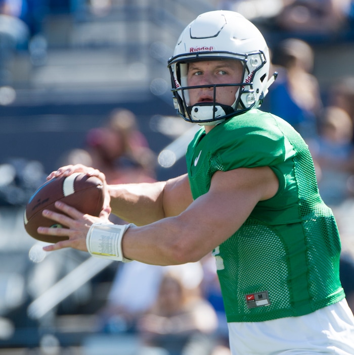 (Rick Egan  |  The Salt Lake Tribune)  BYU quarterback, Beau Hoge (7) runs the offense during  a BYU public scrimmage at Lavell Edwards Stadium, Thursday, August 17, 2017.