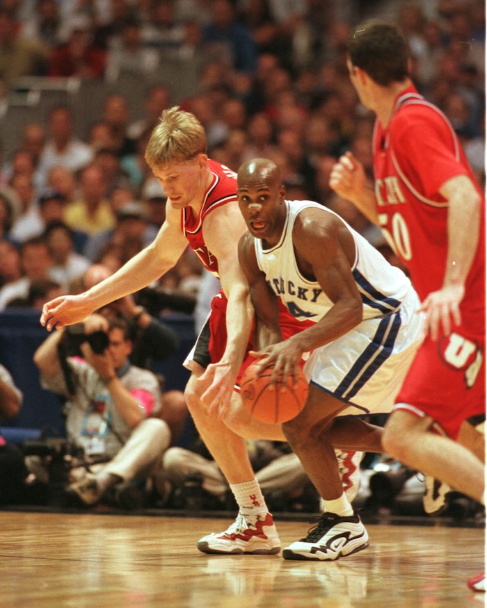 (Steve Griffin  |  Tribune file photo)  Utah's Michael Doleac and Alex Jensen (right) defending Kentucky's Heshimu Evans in the 1998 championship game in San Antonio, Texas.