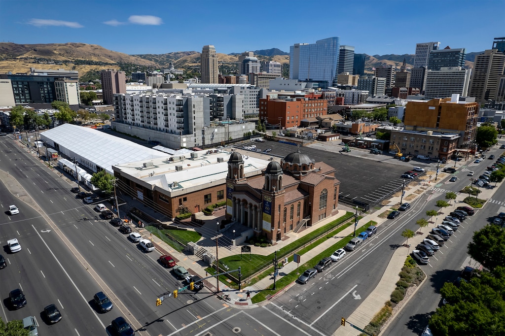 (Rick Egan | The Salt Lake Tribune)  Holy Trinity Cathedral and the vacant lot where the La France Apartments once stood on Saturday, Aug. 24, 2024.