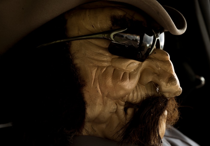 (Leah Hogsten  |  The Salt Lake Tribune) Parked on the shoulder of Highway 24, Wayne County sheriff's "deputy" Parker Doolittle deters would be speeders in the small town of Loa, Utah, Sept. 13, 2017.