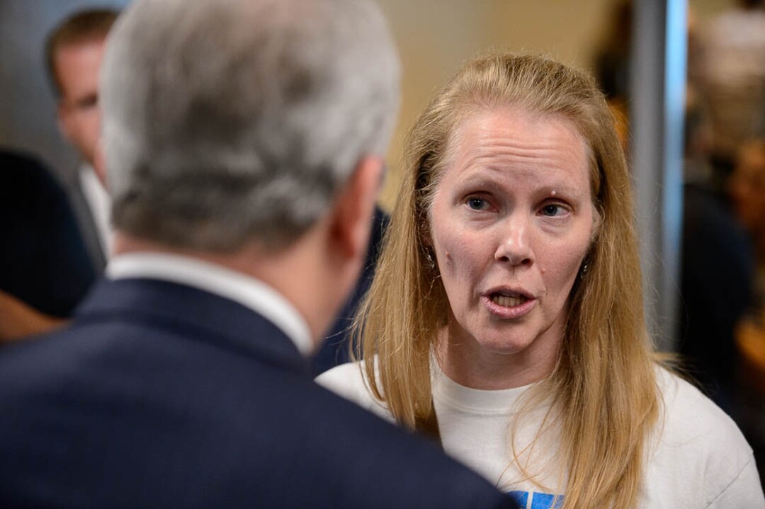 (Trent Nelson | The Salt Lake Tribune)  Heather Nelson, an active LDS member supporting the medical marijuana initiative, talks to Jack Gerard of the LDS Church after a news conference in Salt Lake City, Thursday Aug. 23, 2018.