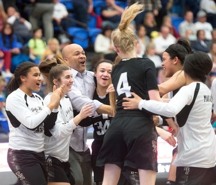 (Rick Egan | The Salt Lake Tribune) The Highand High Rams celebrate their win over the Corner Canyon Chargers, in Class 5A women's basketball playoff game between Corner Canyon and Highland, Monday, Feb. 19, 2018.