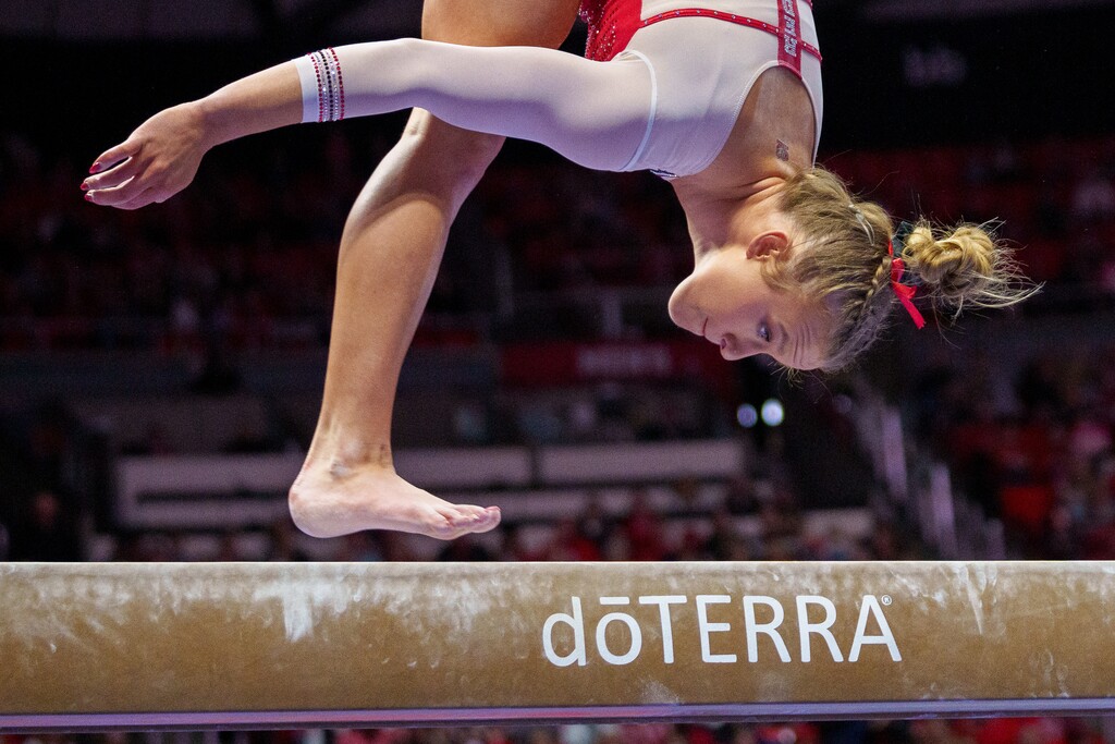 (Trent Nelson  |  The Salt Lake Tribune) Abby Paulson on the beam as Utah hosts Washington, NCAA gymnastics in Salt Lake City on Saturday, Jan. 28, 2023.