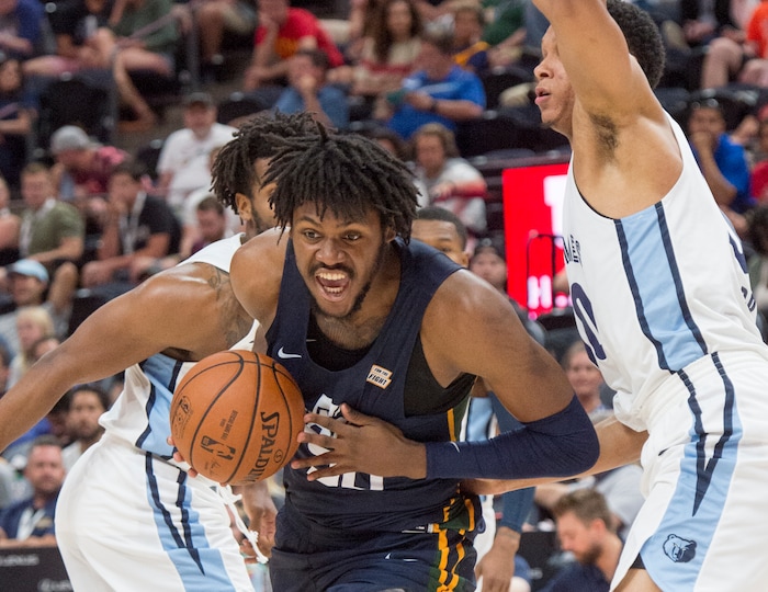 (Rick Egan  |  The Salt Lake Tribune)     Utah Jazz center Diamond Stone (50) works for a shot, as Memphis Grizzlies forward Ivan Rabb (10) defends, in Jazz summer league action between Utah Jazz and Memphis Grizzlies in Salt Lake City, Tuesday, July 3, 2018.