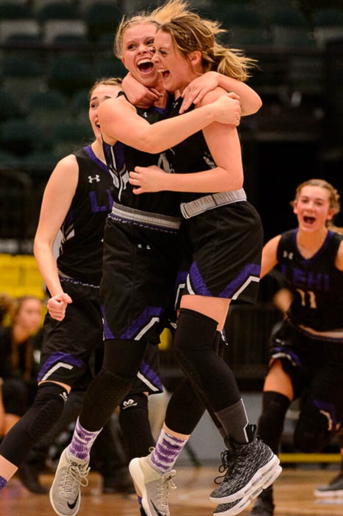 (Trent Nelson | The Salt Lake Tribune)
Lehi vs. Desert Hills, 4A State high school basketball tournament at Utah Valley University in Orem, Thursday March 1, 2018. Lehi's Mikayla Mineer (44) embraces Lehi's Alli Butterfield (3) as the team comes from behind to tie the score going into halftime.